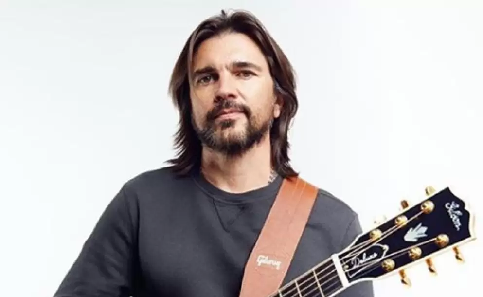 Juanes sorprende a fan que cantaba a todo pulmón "Es por ti" en su auto
