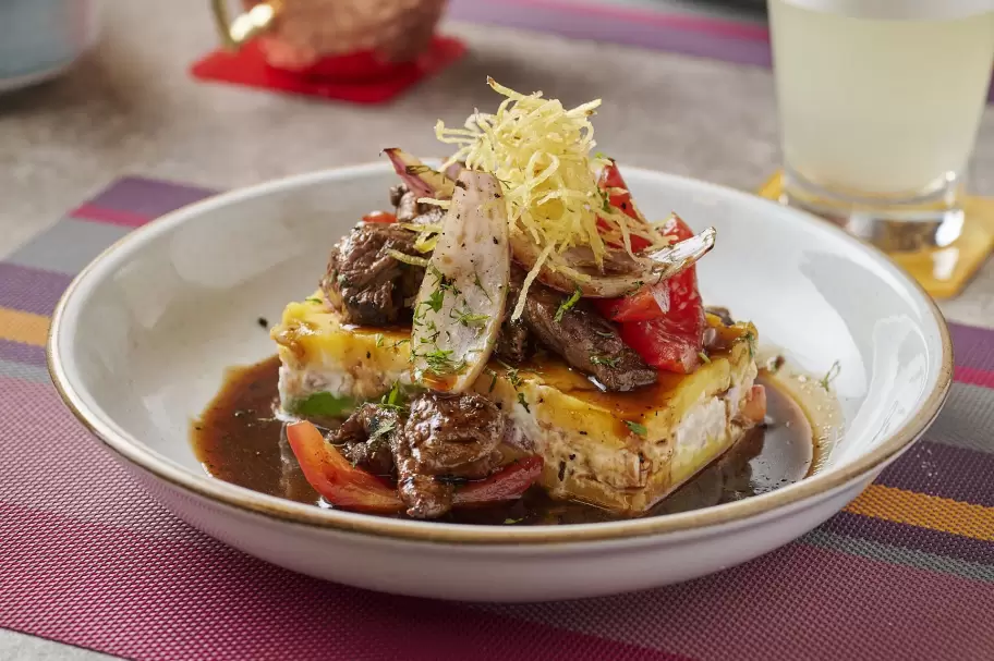 Causa Montada, una de las especialidades de Maqya.