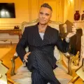 Robbie Williams rompe récord histórico y supera a The Beatles