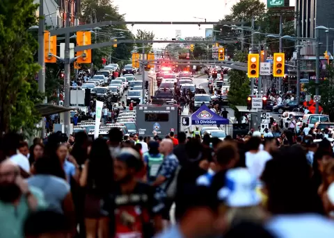 Police respond to an active shooter at the Salsa on St. Clair event in Toronto Saturday.