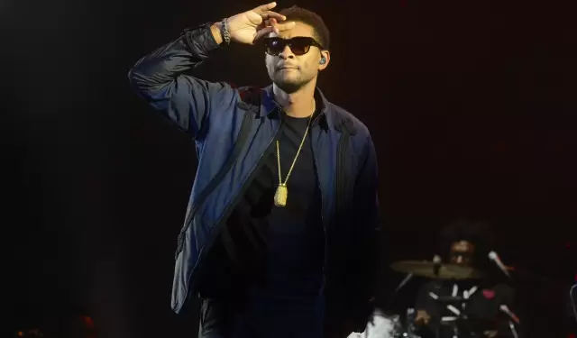 Usher baj� a una fan del escenario tras notarla inc�moda.